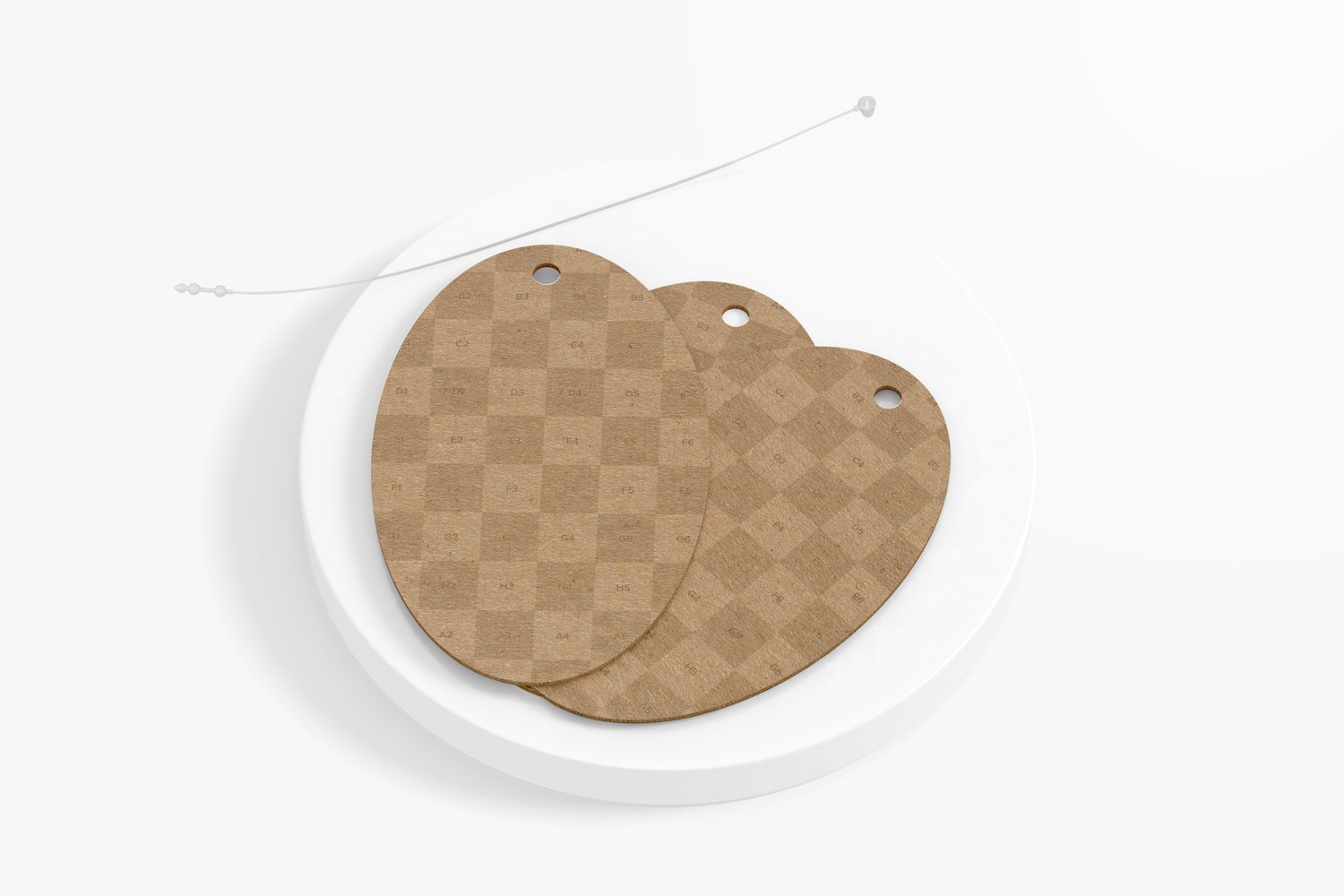 Oval Cardboard Tags with Plastic Loop Mockup, Top View