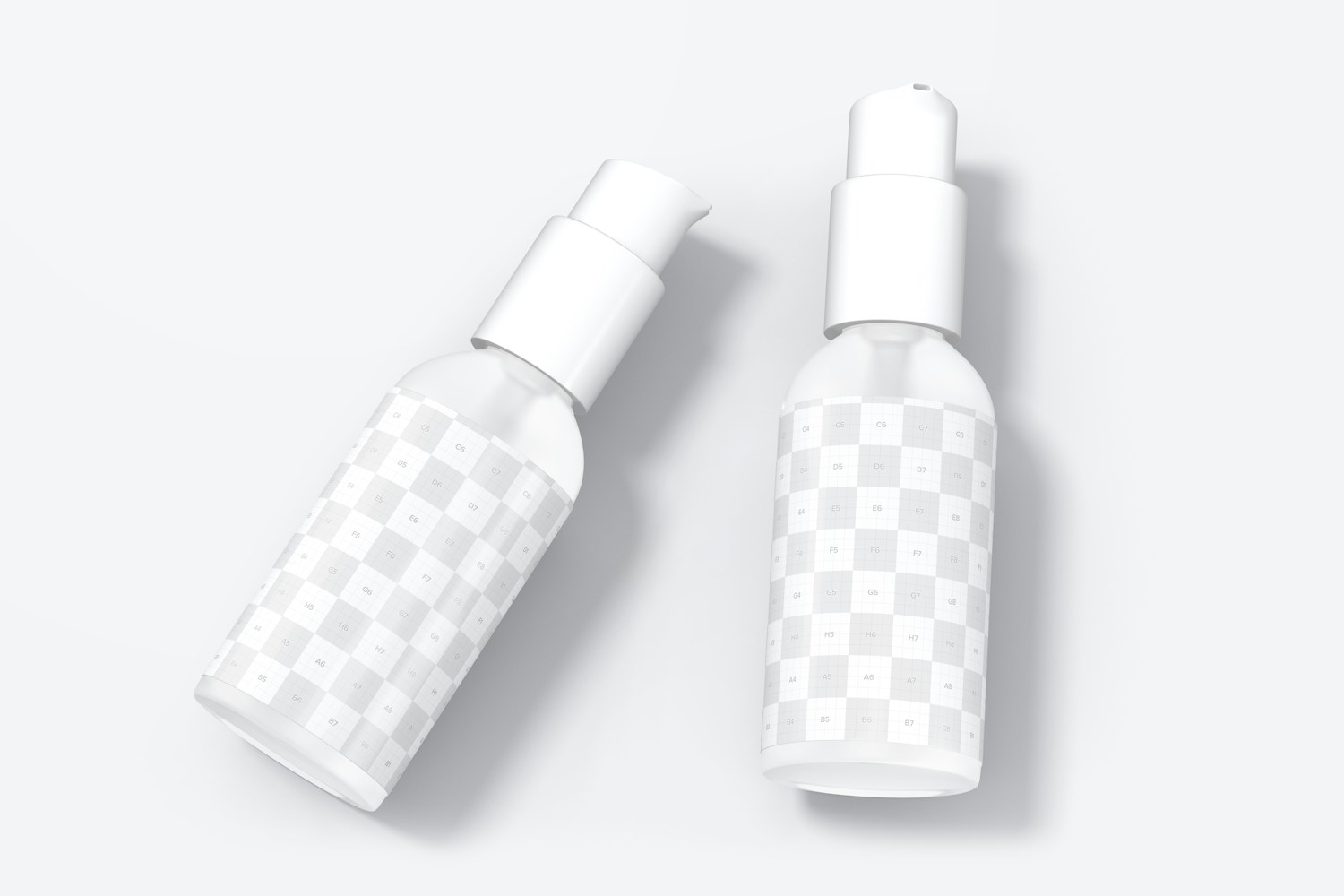 1 oz Frosted Glass Boston Round Bottles Mockup, Top View 1 oz Frosted Glass Boston Round Bottles Mockup, Top View