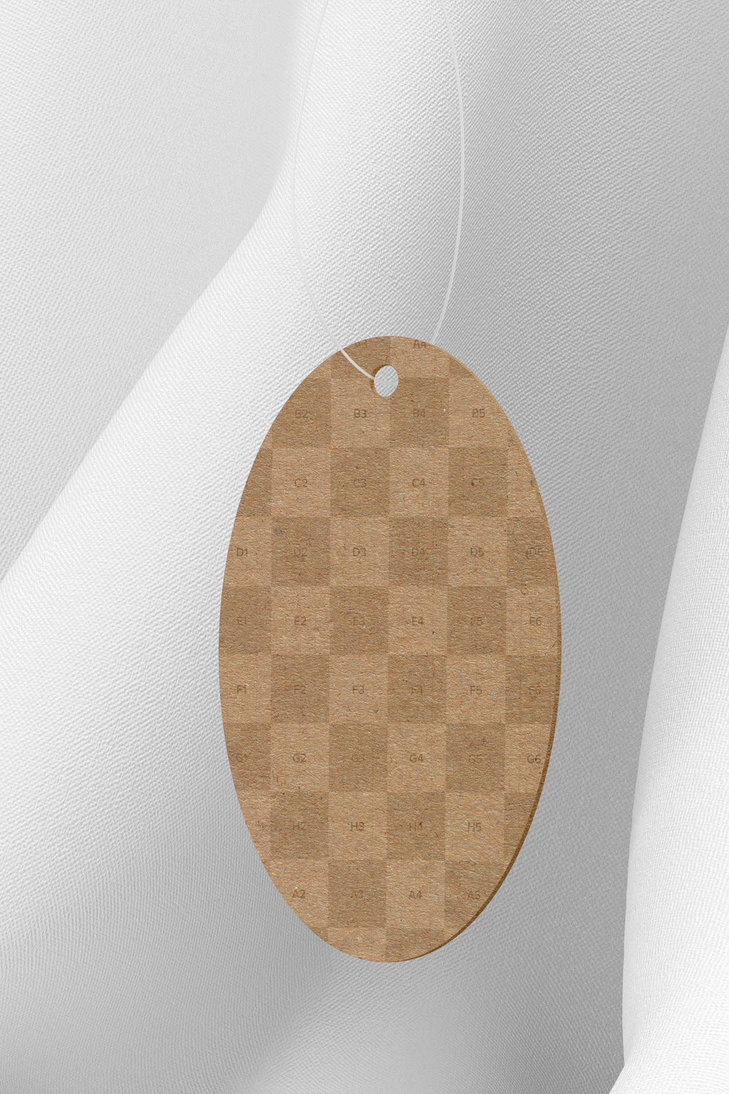 Oval Cardboard Tag with Plastic Loop Mockup, Hanging