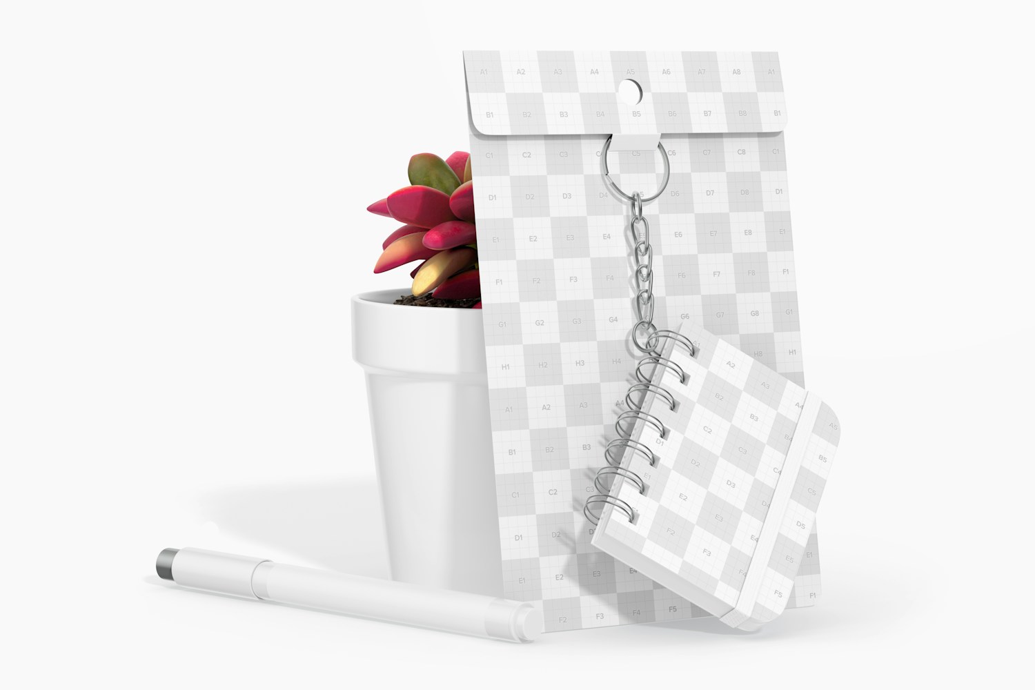 Mini Notebook with Keychain Mockup, with Plant